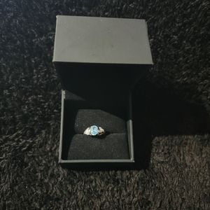 Blue topaz ring